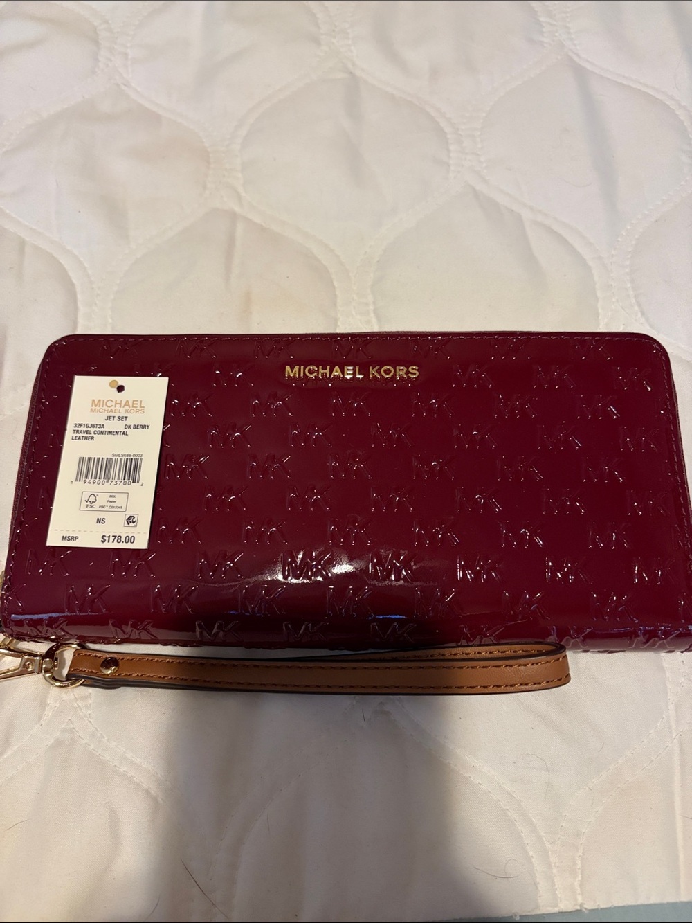 Michael Kors Patent Leather Wristlet in Deep Burgundy with Gold Logo